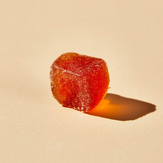 Macro photograph of a single NarrowPath Relax gummy