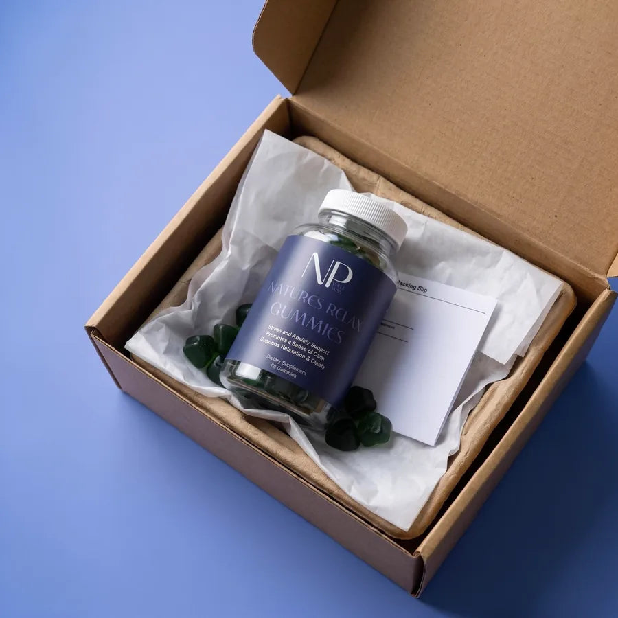 A NarrowPath bottle beside its shipping box and welcome card